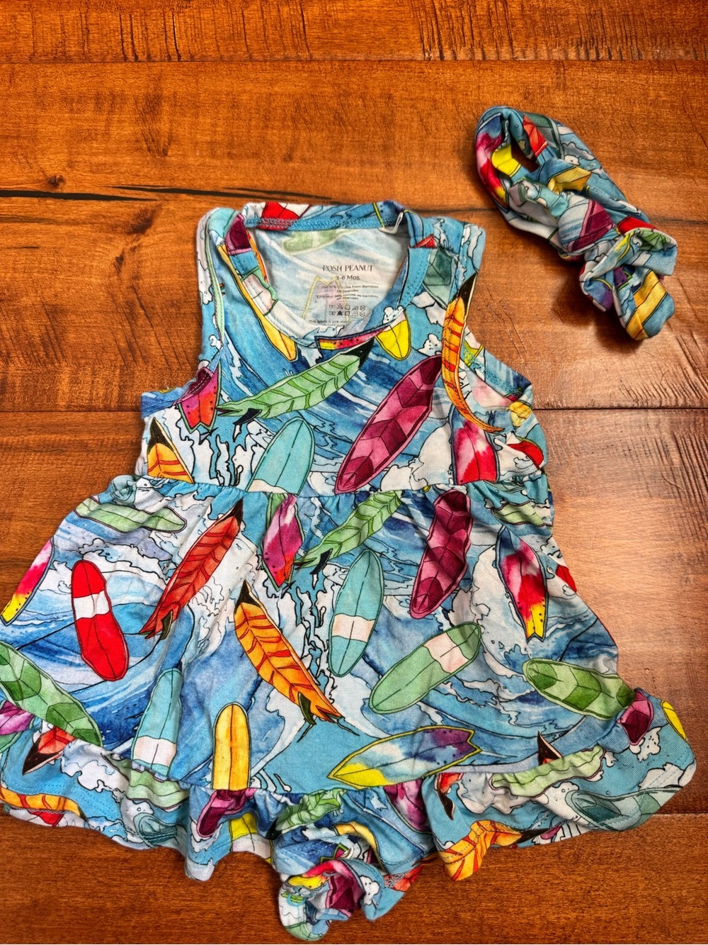 Posh Peanut Blue Surfboard Print Romper with Multicolor Accents and matching bow